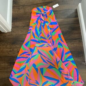 NWT strapless XS mini dress with high low back .